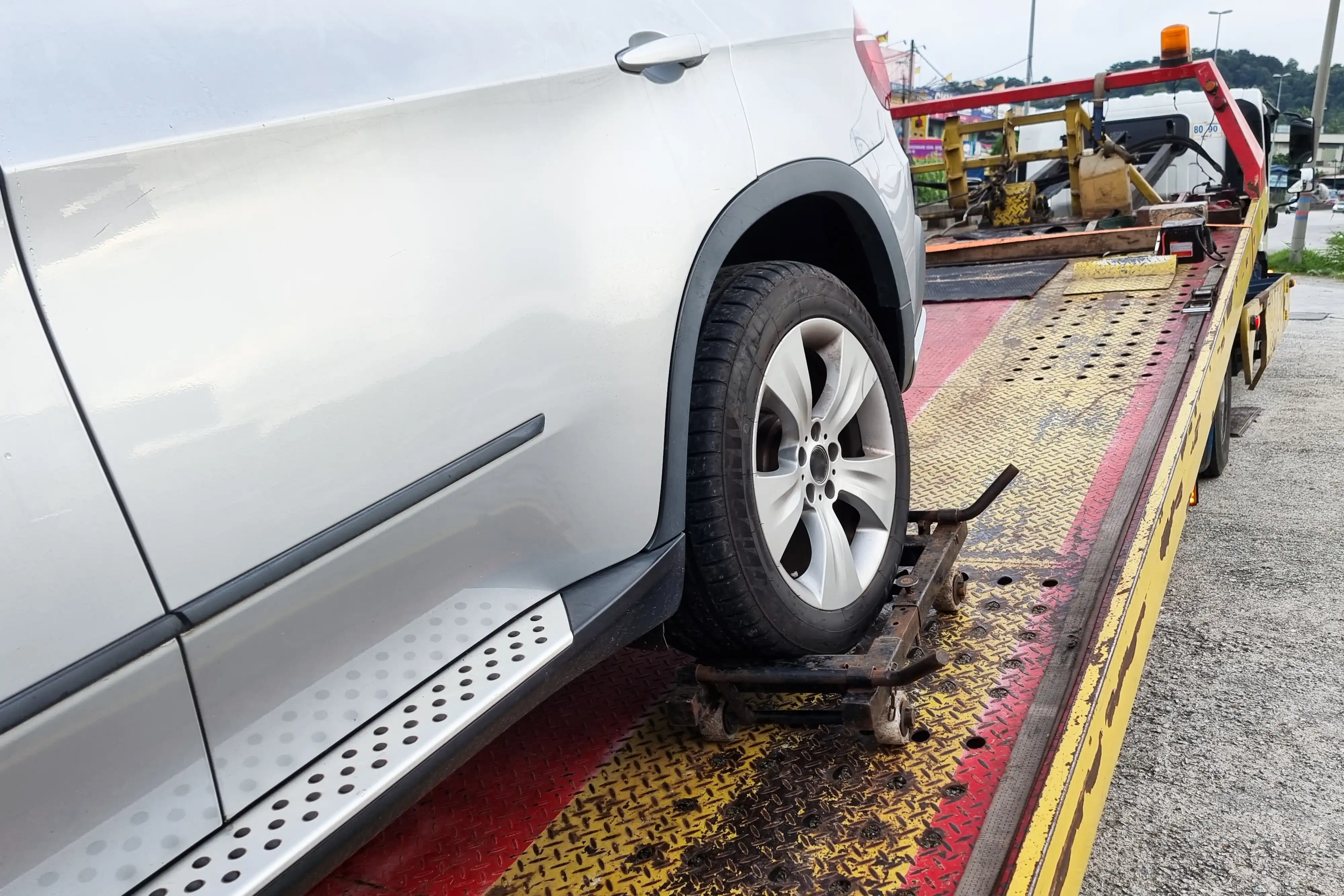 Car being loaded onto a Fast Track Recovery flatbed tow truck in Stoke-on-Trent
